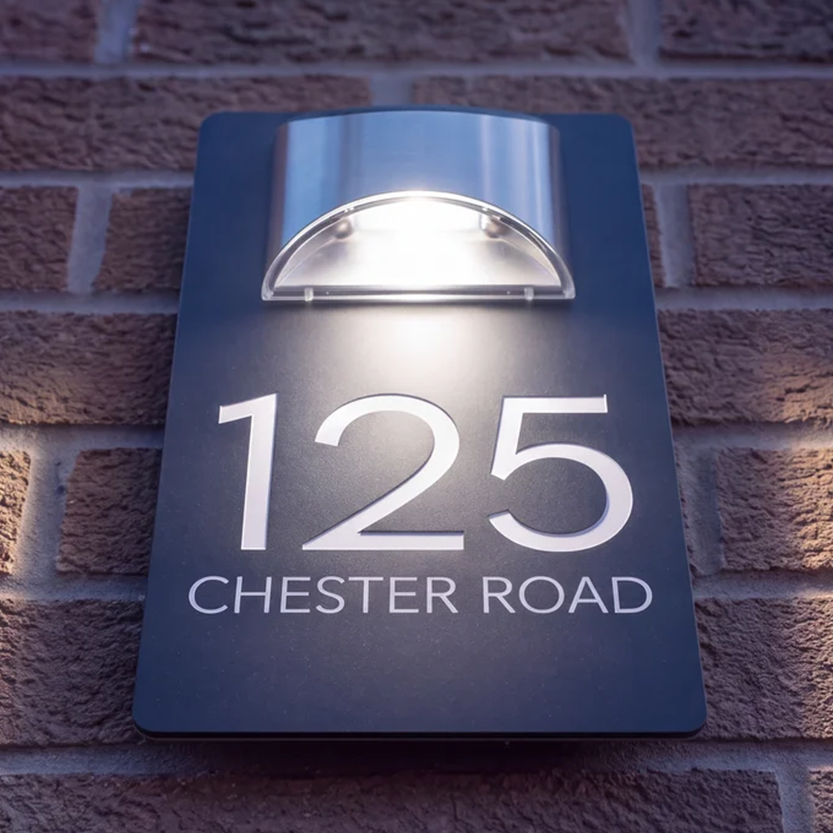 Collection of personalised solar-powered house signs in black, grey and white finishes - SignStation