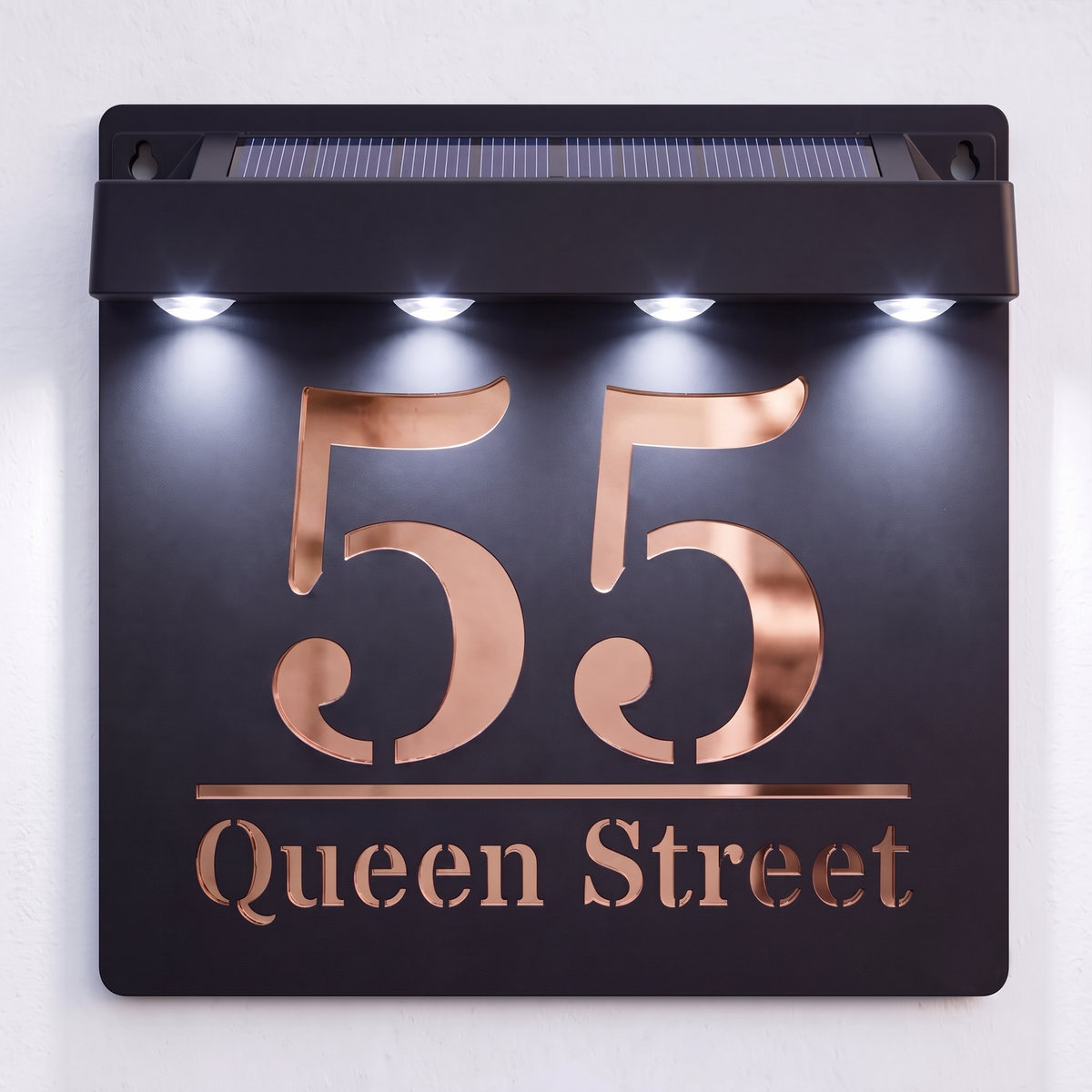 Side profile of a Black solar powered house sign showing the panel and light diffuser